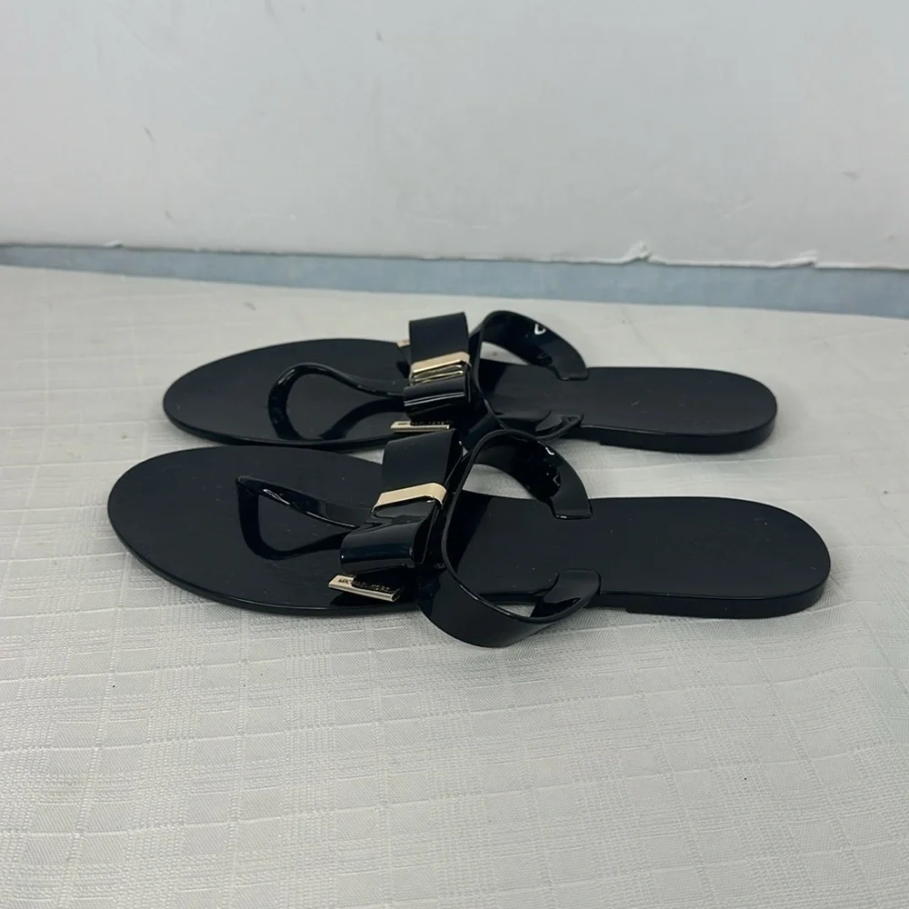 Michael Kors Kayden Jelly Bow Tie Thong Sandals in Black. Size 10.